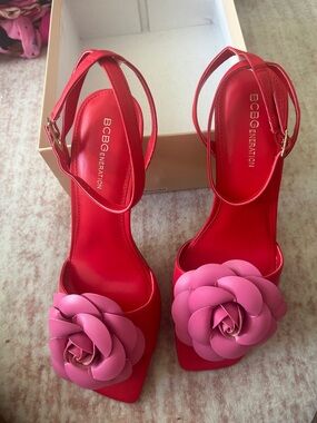 BCBGeneration Red Ankle-Strap Heels with Pink Floral Rosettes